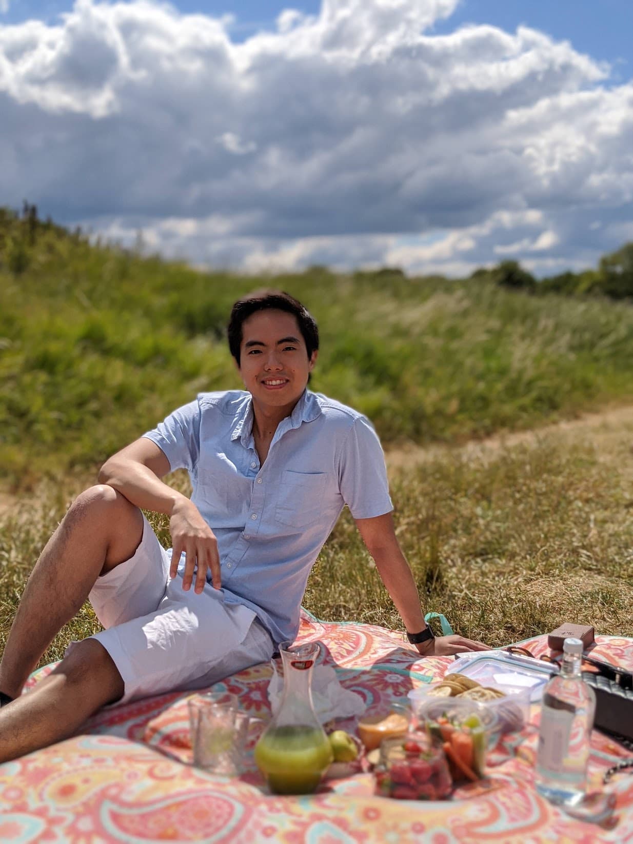 Tiger chilling on a picnic mat on a nice sunny day